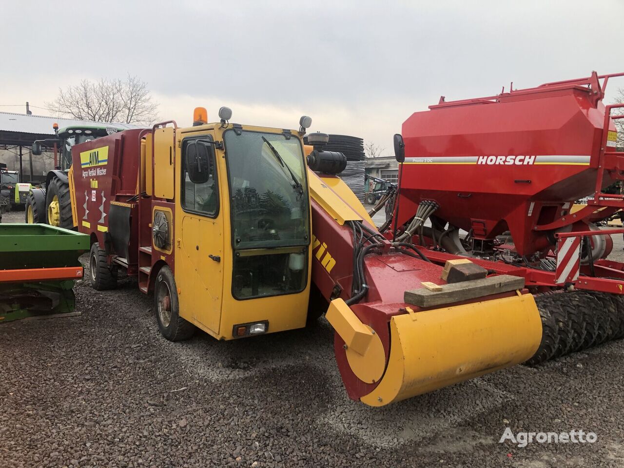 John Deere Mikser samokhidnyi selvgående fôr mikser